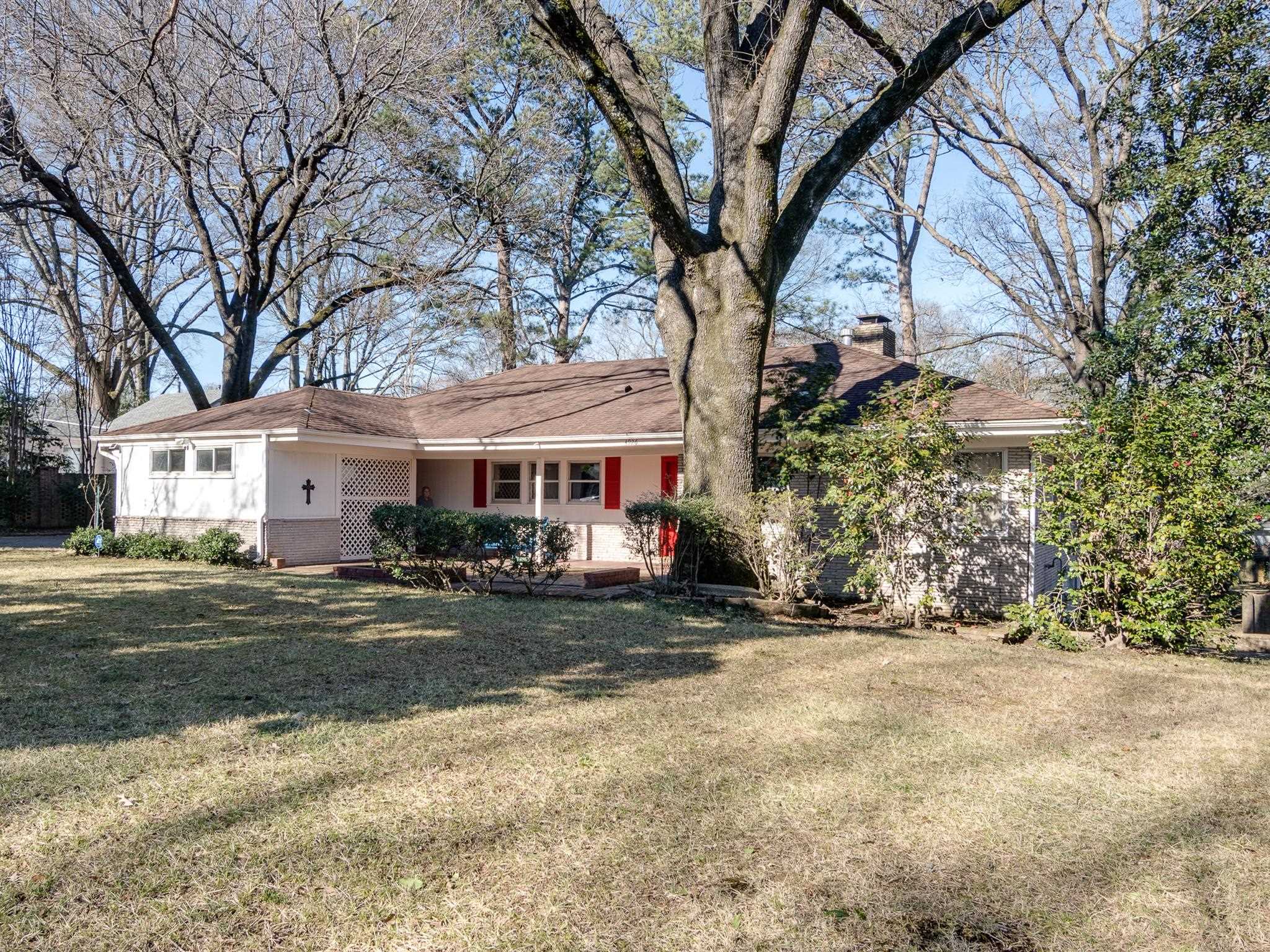 4926 Shady Grove Road Memphis, TN 38117 - Photo 2 of 23 a view of a house with a yard covered in snow