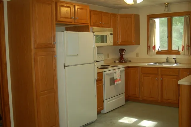 a living room with furniture and window