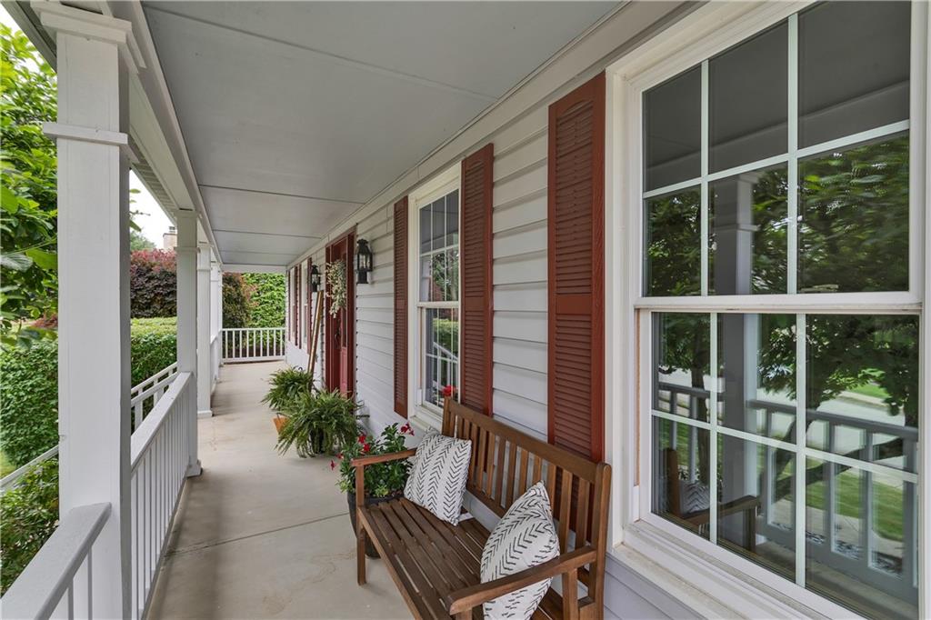 3 Sarah Court Irwin, PA 15642 - Photo 5 of 36 Enjoy Your Morning Coffee on the Covered Front Porch that Spans the Length of the Home.