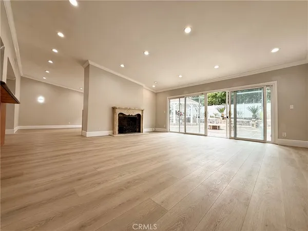 a view of an empty room and window