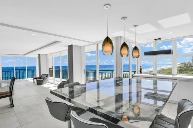 a kitchen with a large window and sink