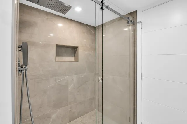 a bathroom with a sink and mirror