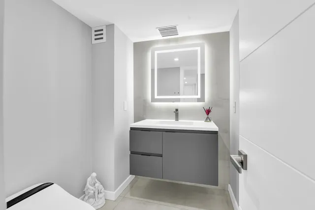 a front view of a building with outdoor space