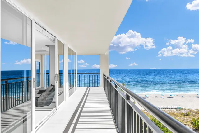 a view of a lake with a building in the background