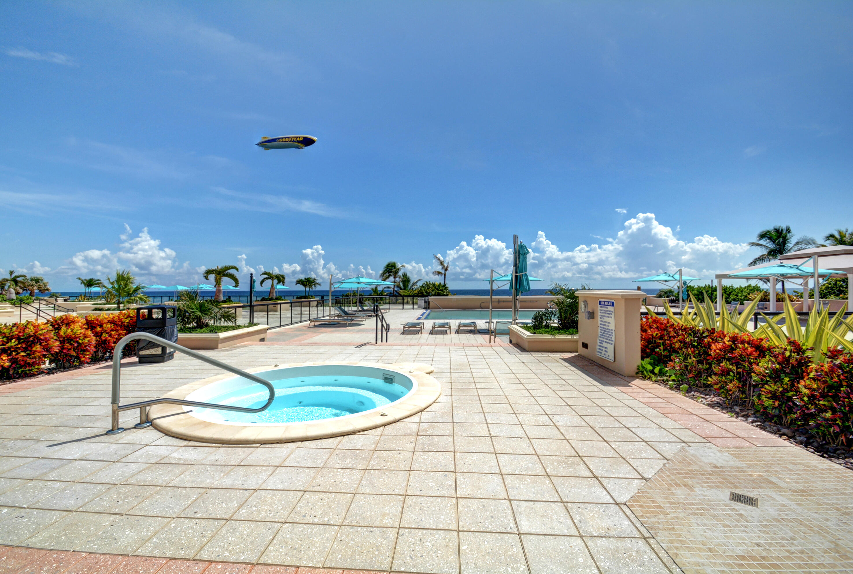 2000 South Ocean Boulevard, Unit 6K Boca Raton, FL 33432 - Photo 60 of 94 a view of a swimming pool with a patio