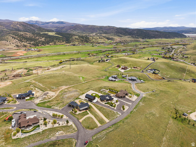 402 Shadow Hill Road Wanship, UT 84017 - Photo 88 of 90 Aerial view of property's location featuring a mountainous background and nearby suburban area