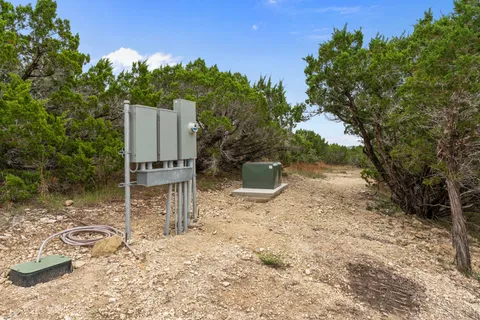 a view of a back yard of the house