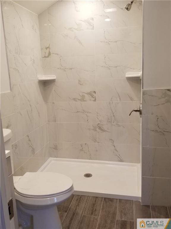 29 Hill Road Edison, NJ 08817 - Photo 14 of 15 a bathroom with a toilet and a shower