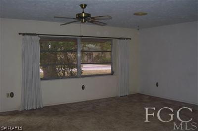2329 Caladium Road Fort Myers, FL 33905 - Photo 3 of 7 a room that has a window in it