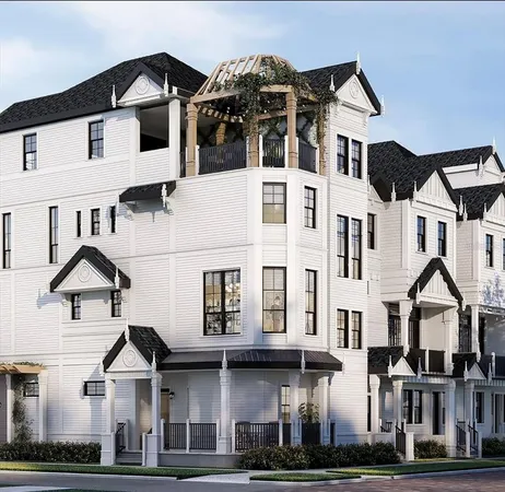 a front view of a large white building