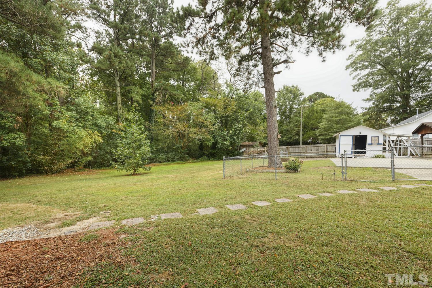 4008 Cheek Road Durham, NC 27704 - Photo 9 of 10 a view of an ocean from a yard