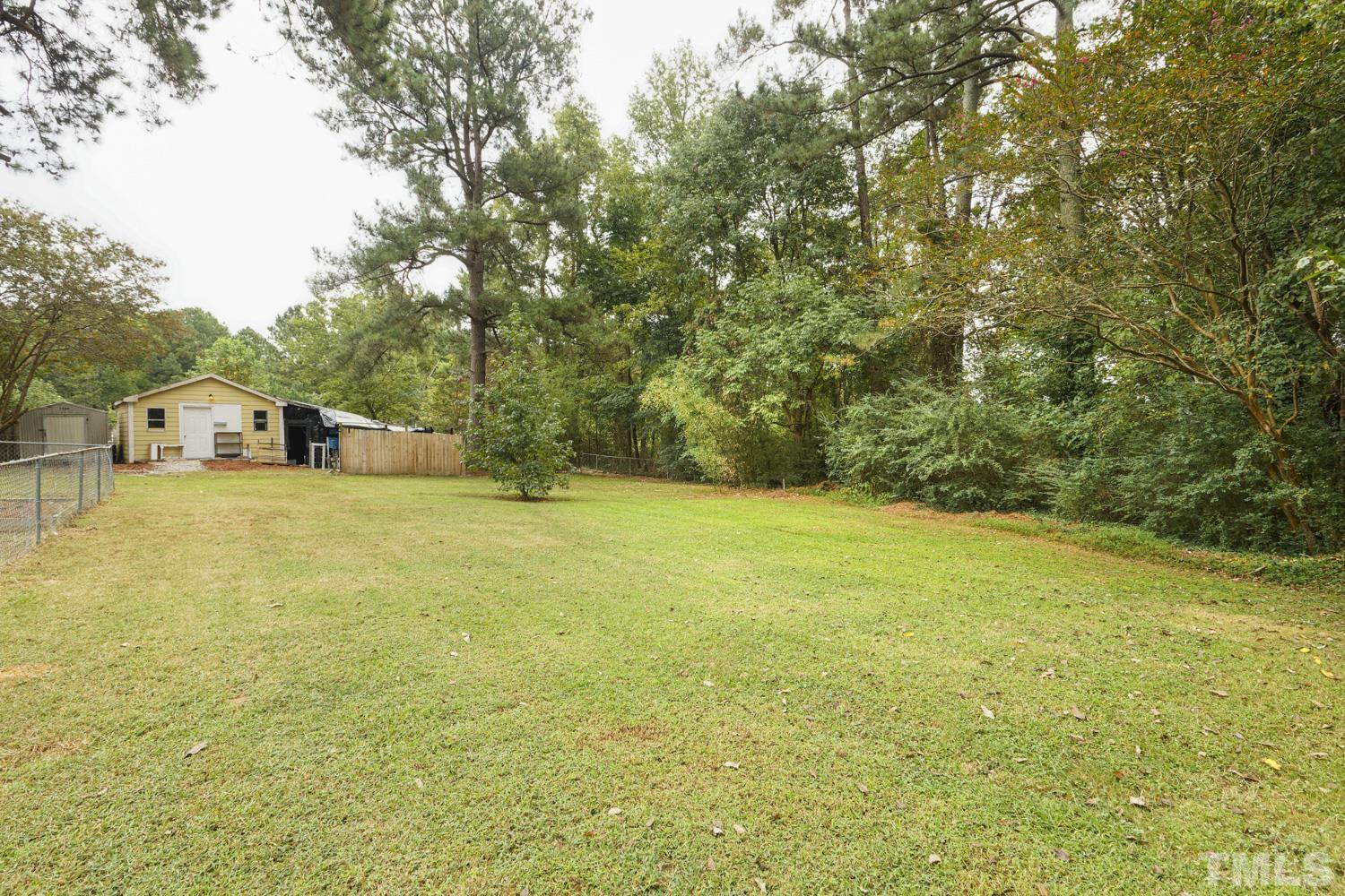 4008 Cheek Road Durham, NC 27704 - Photo 10 of 10 a view of a field with an outdoor space