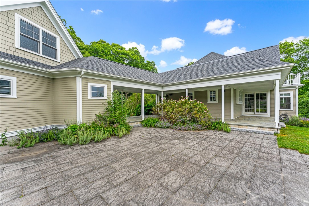 583 Highland Road Tiverton, RI 02878 - Photo 6 of 45 Patio with gas firepit