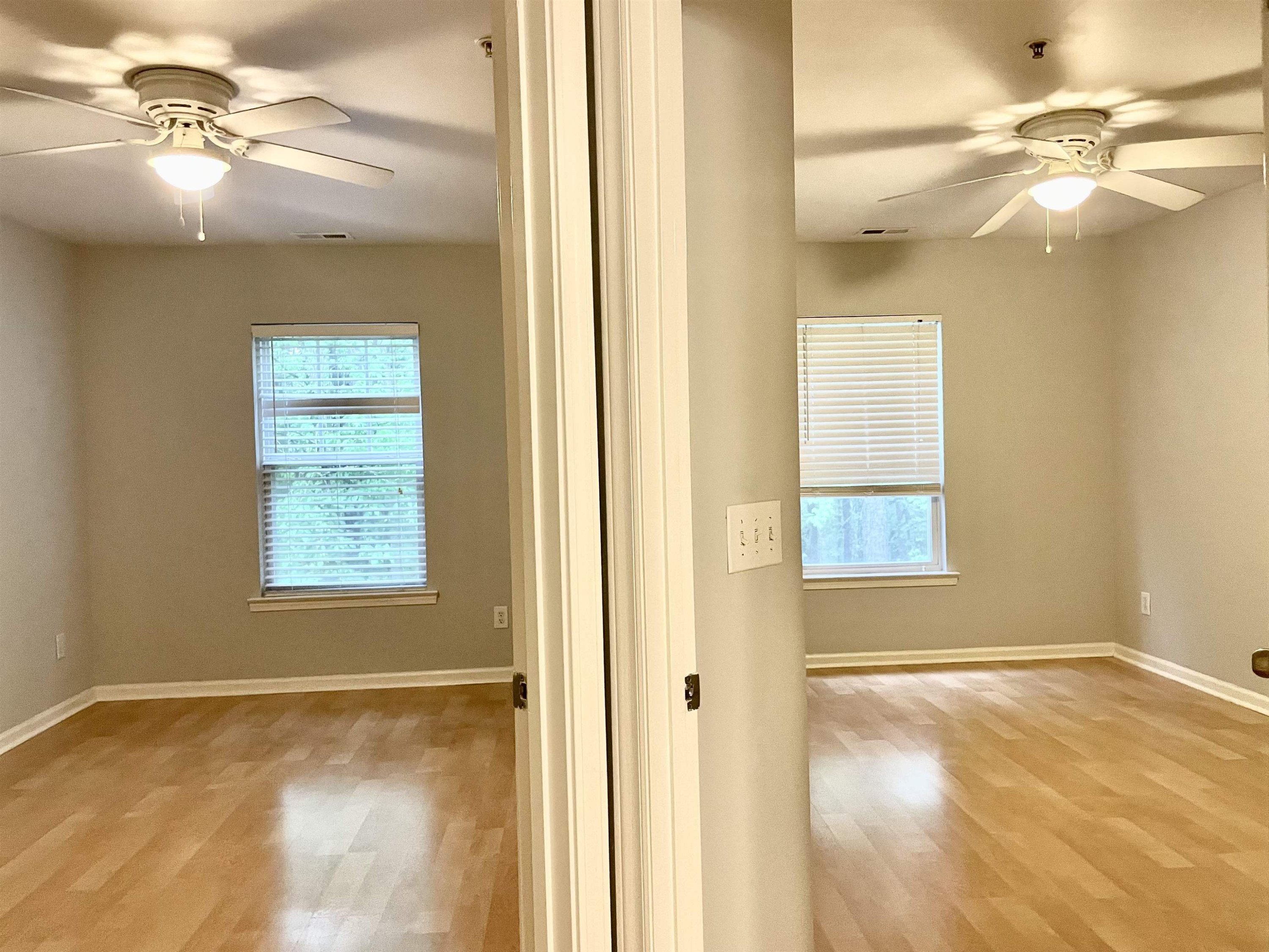 8621 Neuse Club Lane, Unit 109 Raleigh, NC 27616 - Photo 12 of 21 a view of an empty room and window
