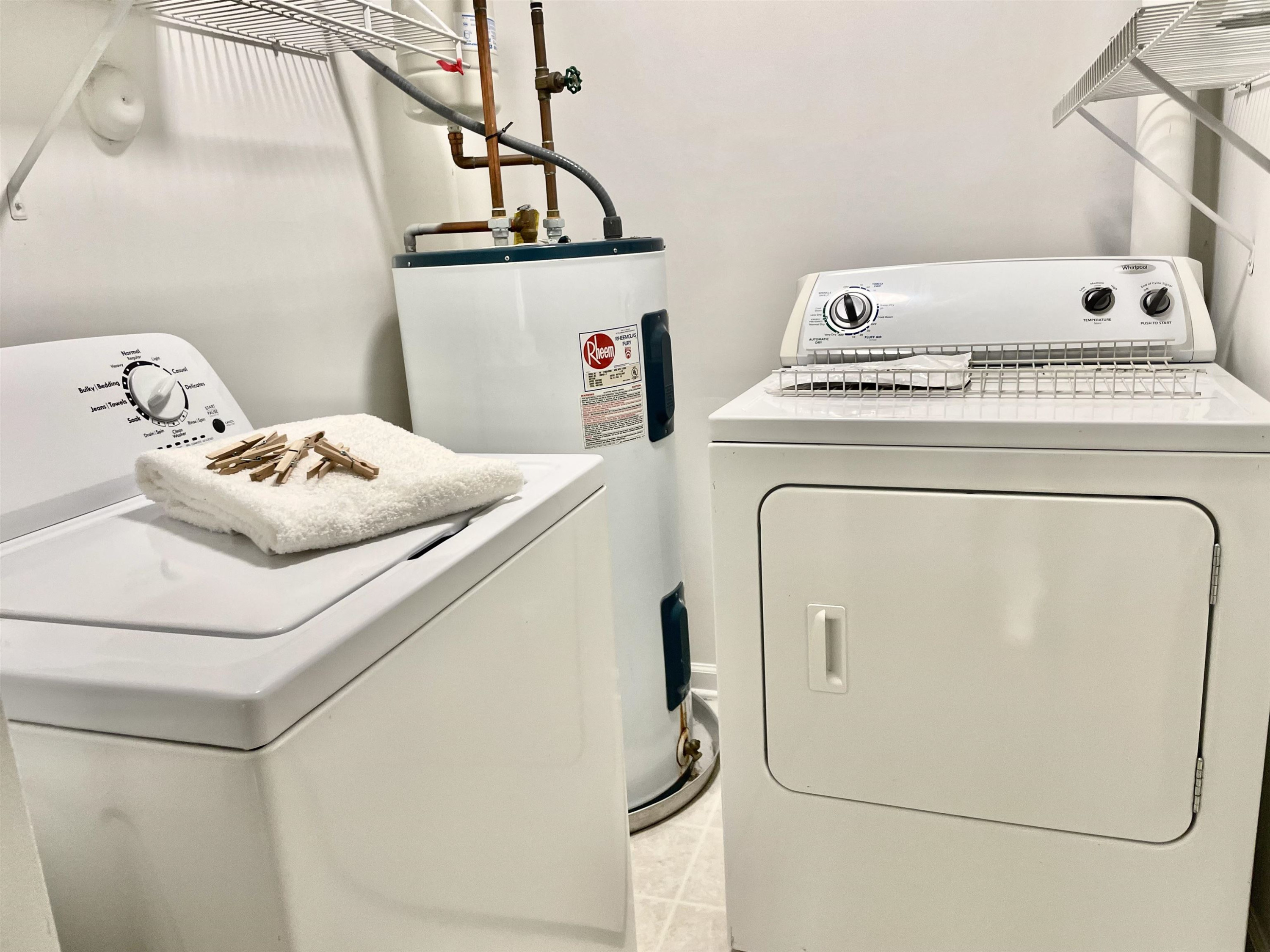 8621 Neuse Club Lane, Unit 109 Raleigh, NC 27616 - Photo 13 of 21 a utility room with dryer and washer