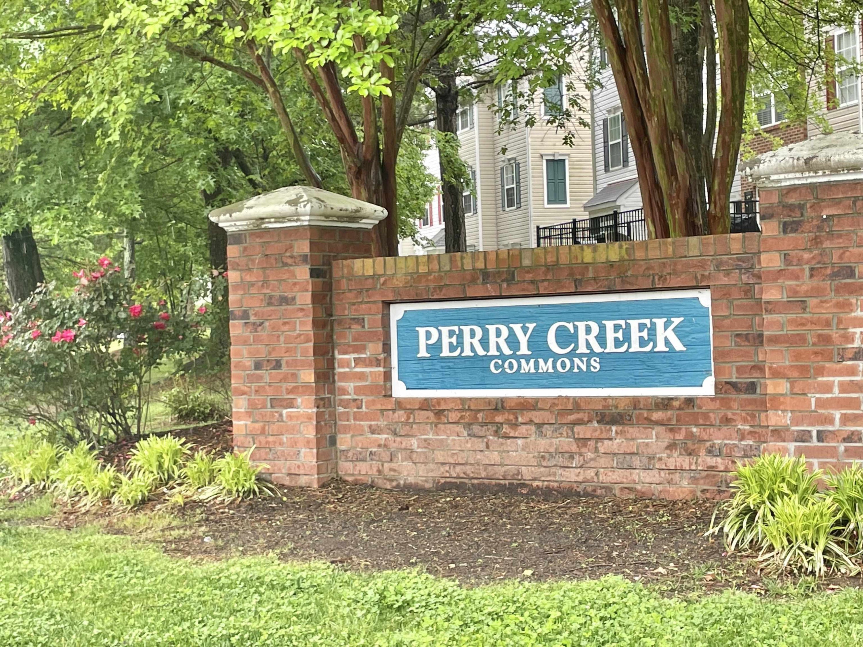 8621 Neuse Club Lane, Unit 109 Raleigh, NC 27616 - Photo 18 of 21 a sign that is on the side of a building