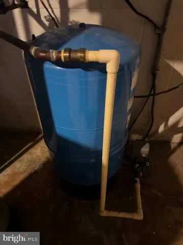 a view of a hallway with seating area