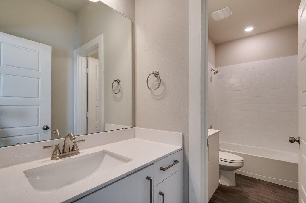 716 Fallow Drive Venus, TX 76084 - Photo 9 of 15 a bathroom with a sink toilet tub and shower