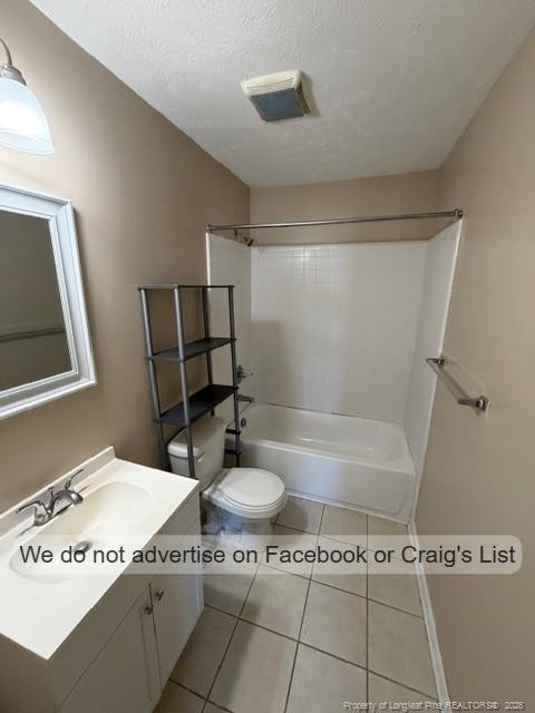 6467 Yadkin Road, Unit 6 Fayetteville, NC 28303 - Photo 6 of 8 a bathroom with a granite countertop sink a toilet a mirror and shower