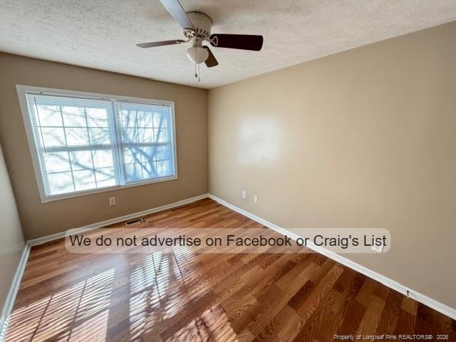 6467 Yadkin Road, Unit 6 Fayetteville, NC 28303 - Photo 7 of 8 a view of an empty room and a window