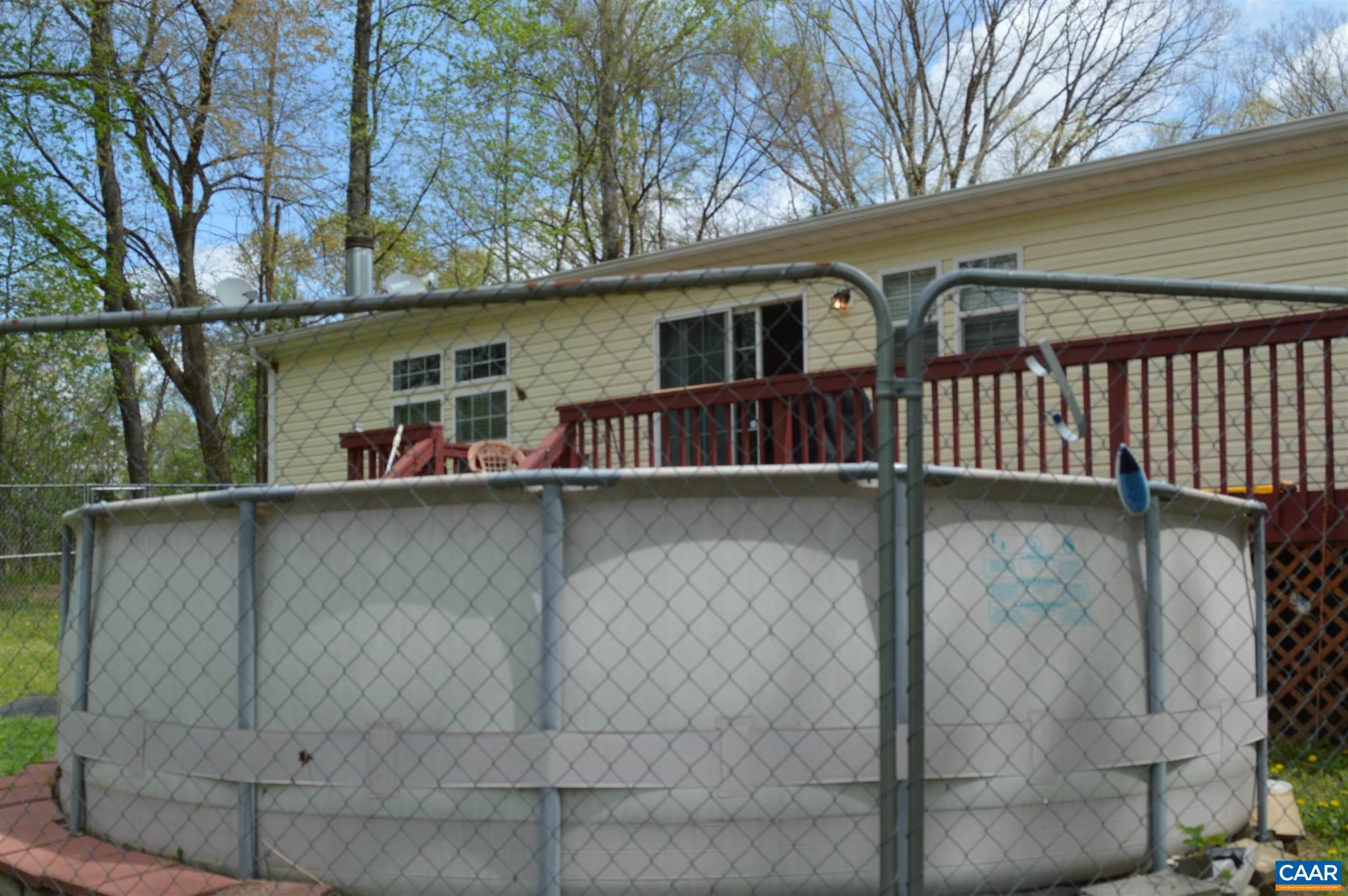 1280 Bell Road Dillwyn, VA 23936 - Photo 4 of 6 a view of back yard of the house