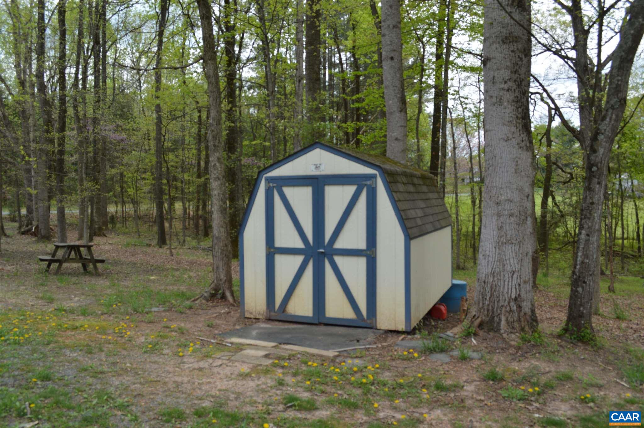 1280 Bell Road Dillwyn, VA 23936 - Photo 5 of 6 a front view of a house with garden