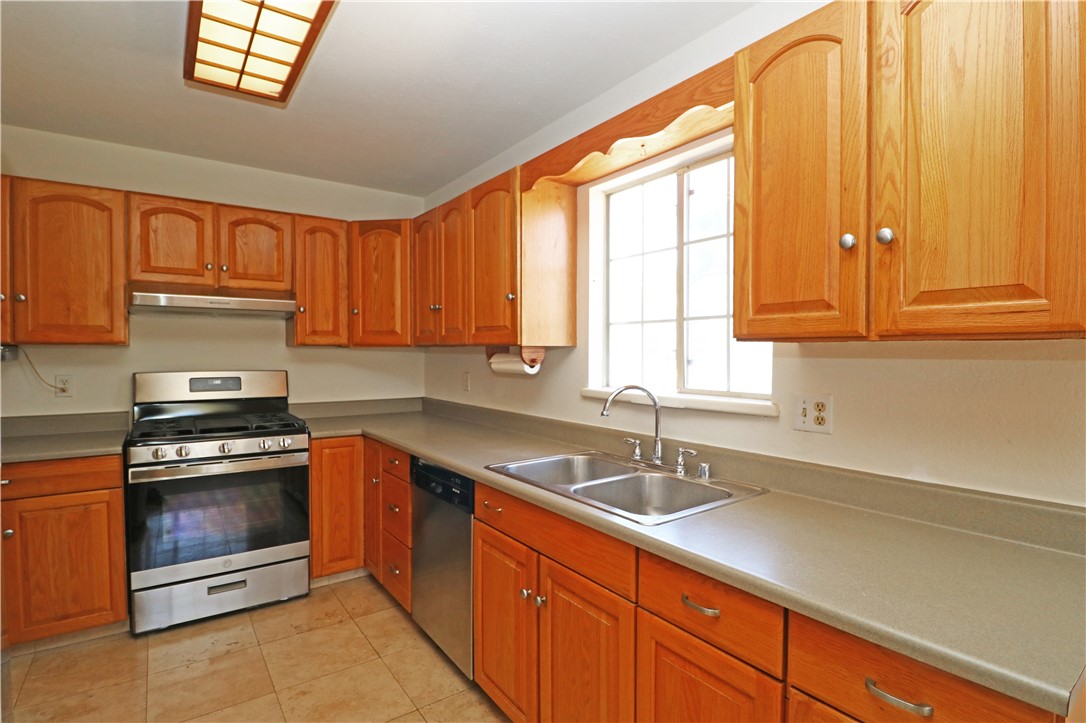 721 North Milford Road Orange, CA 92867 - Photo 14 of 38 Kitchen with plenty of cabinetry and stainless steel appliances 2.