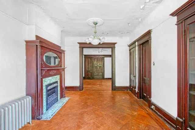 a view of a room with a large window