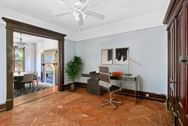 a bedroom with a bed and a fireplace