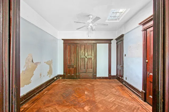 a view of livingroom with furniture and a fireplace