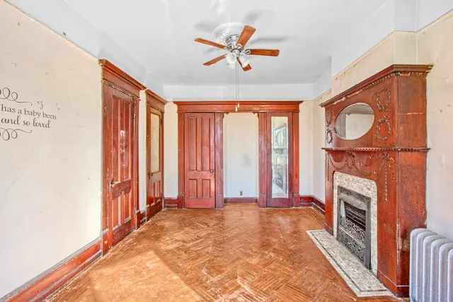 a view of a kitchen with a sink and a window