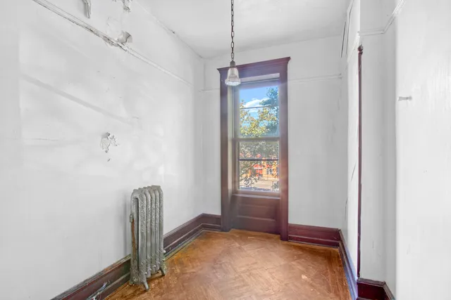 a kitchen with stainless steel appliances granite countertop a sink and dishwasher with wooden floor