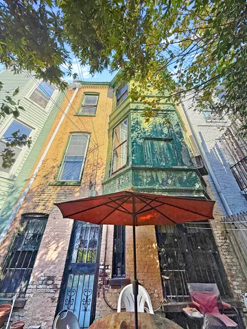 a close up of a sign with a window