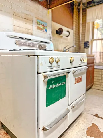a view of a brick building with many windows