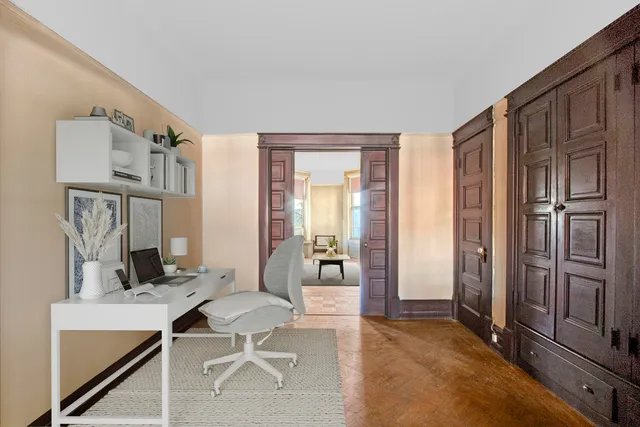 a view of a house with a small yard