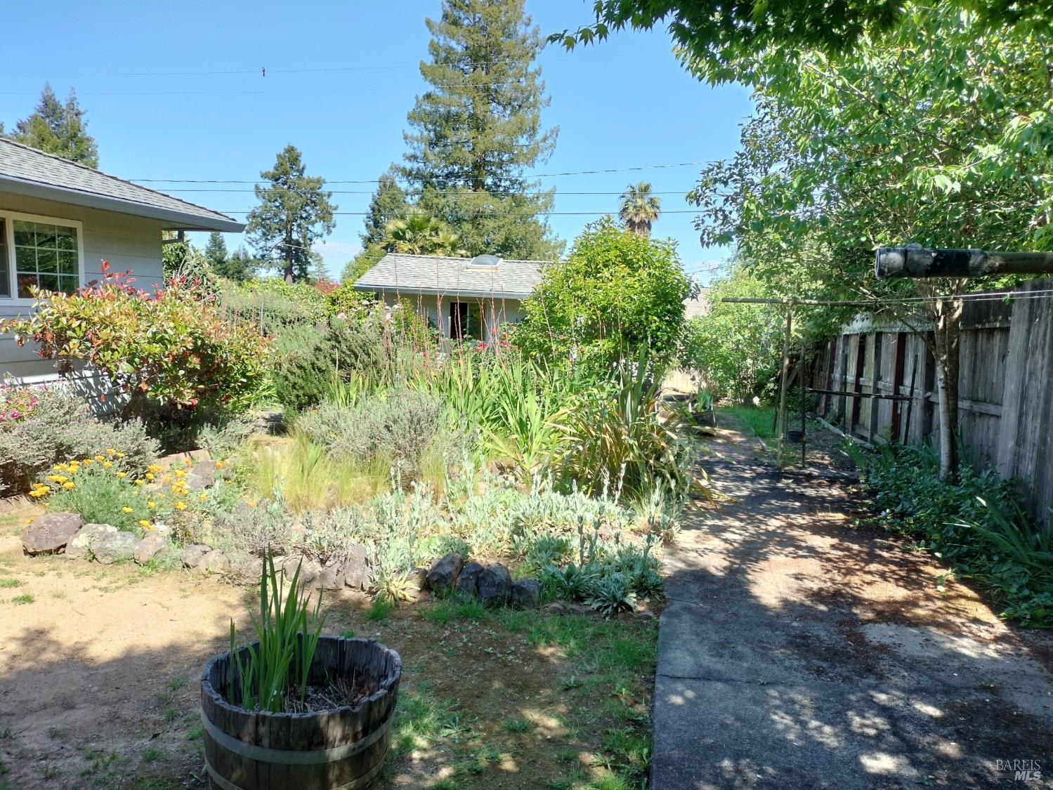 7149 Lynch Road Sebastopol, CA 95472 - Photo 22 of 25 a front view of house with yard and green space