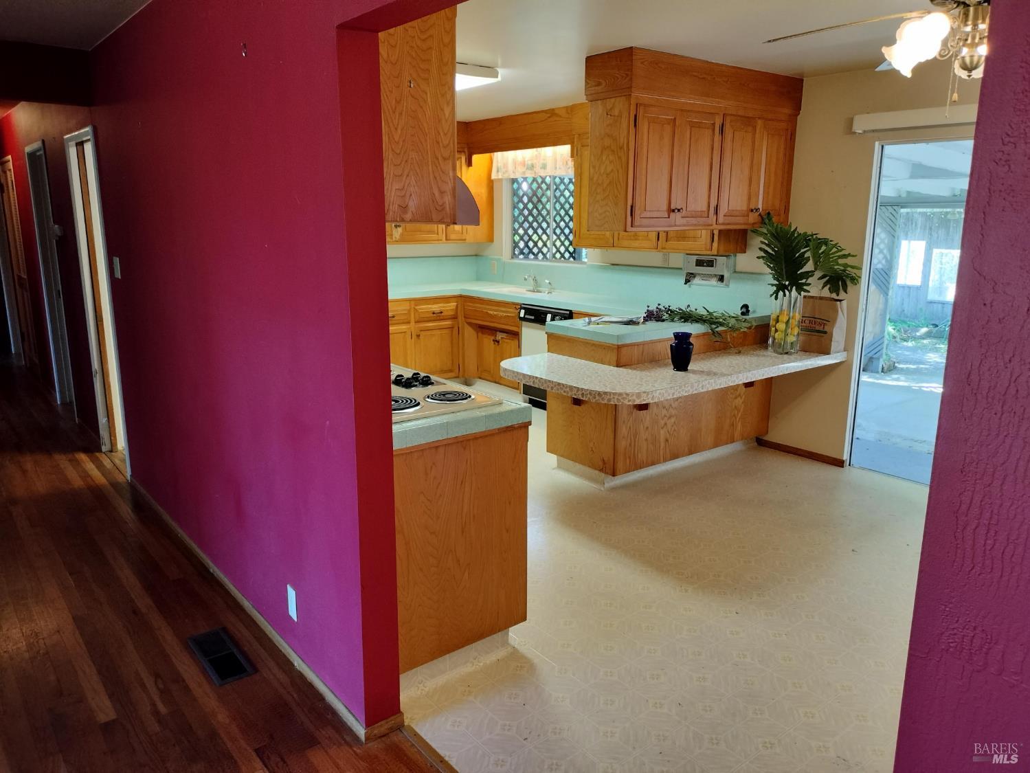 7149 Lynch Road Sebastopol, CA 95472 - Photo 5 of 25 a kitchen with stainless steel appliances granite countertop a stove a sink and a refrigerator