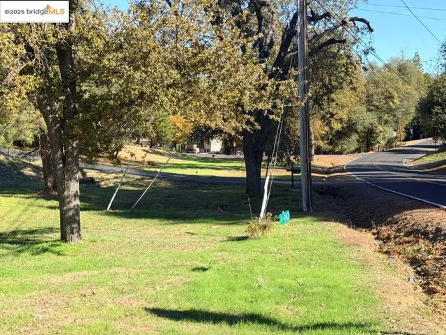a view of a swimming pool with a bench