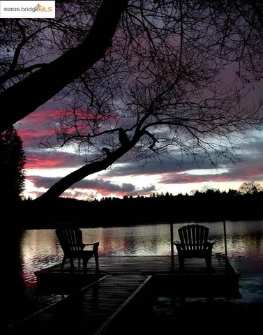 a view of a backyard of the house