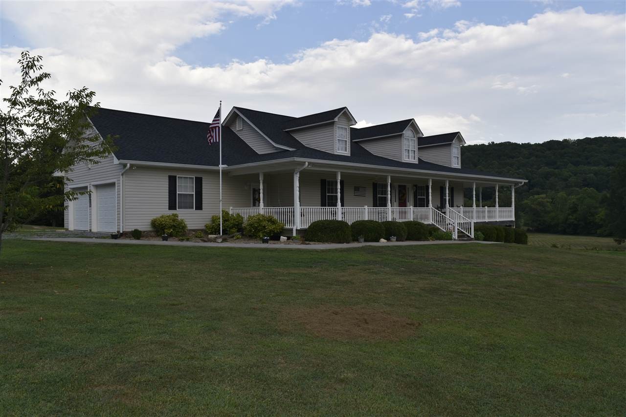 470 No Pone Valley Road Northwest Georgetown, TN 37336 - Photo 1 of 1 a front view of a house with a garden