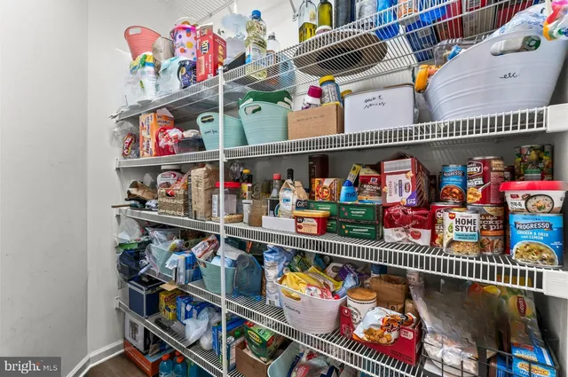 a kitchen that has a sink and a stove