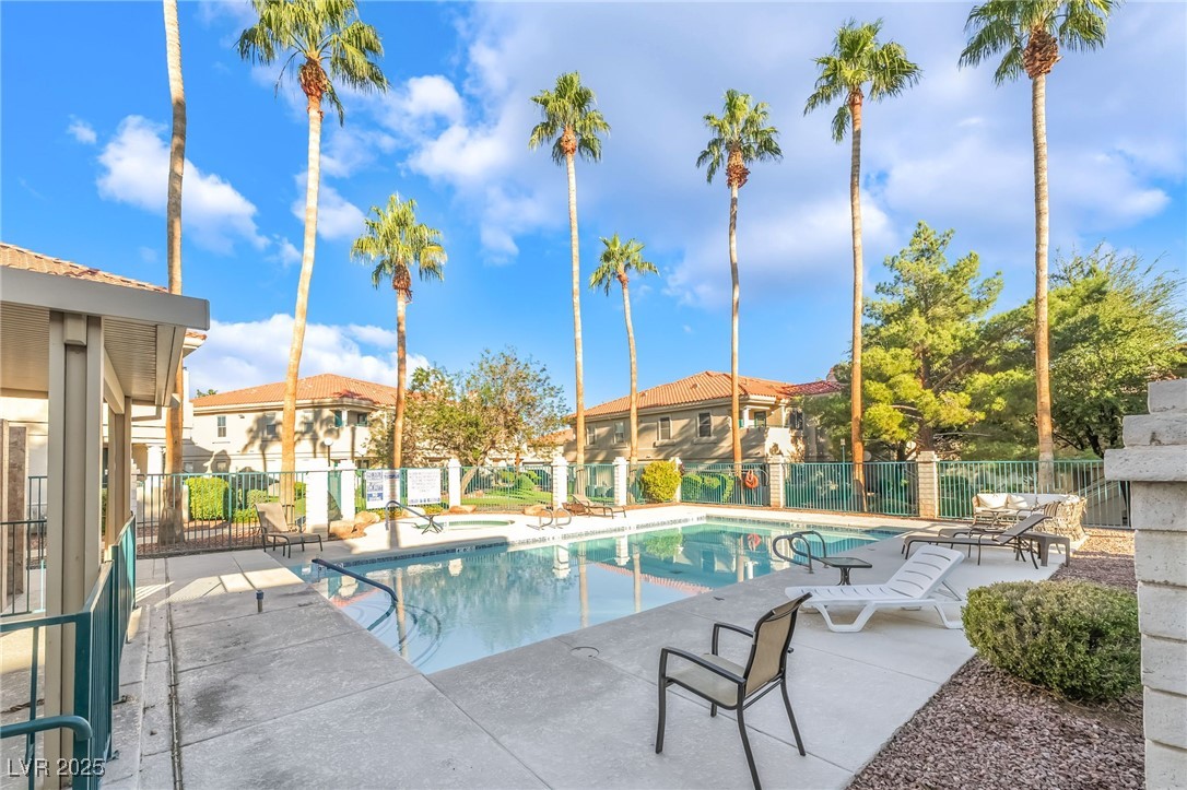 1509 Dallas Terrace, Unit 294 Henderson, NV 89014 - Photo 24 of 27 Community pool with a patio area
