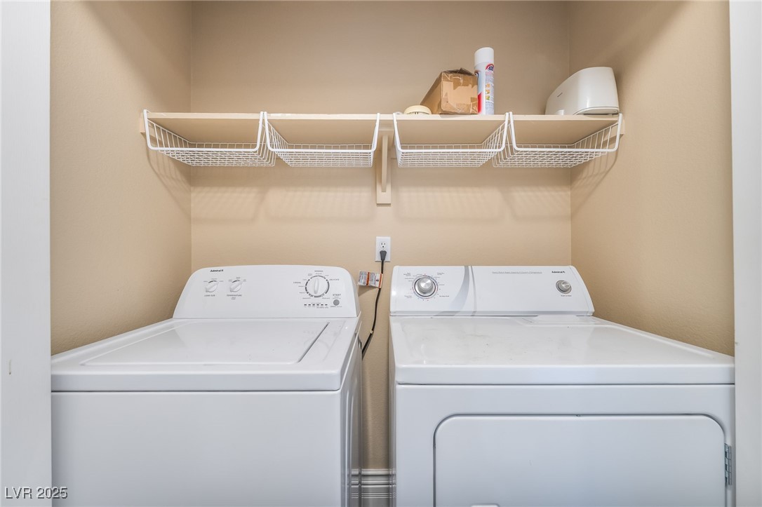 1509 Dallas Terrace, Unit 294 Henderson, NV 89014 - Photo 27 of 27 Laundry area featuring washer and clothes dryer