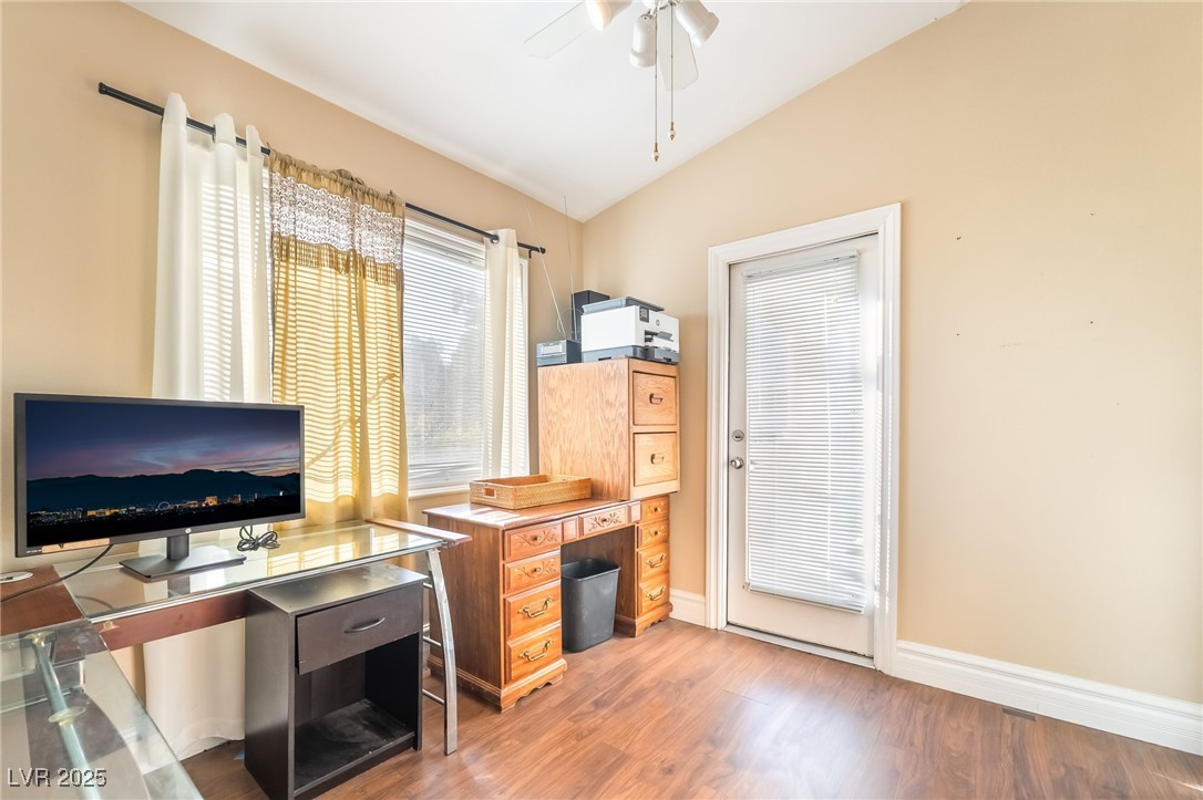 1509 Dallas Terrace, Unit 294 Henderson, NV 89014 - Photo 6 of 27 Office space featuring light wood-type flooring, vaulted ceiling, and ceiling fan