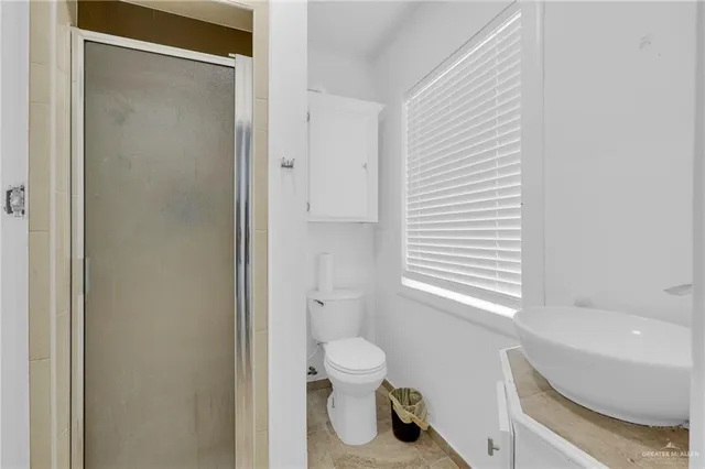 a bathroom with a toilet sink and a bathtub