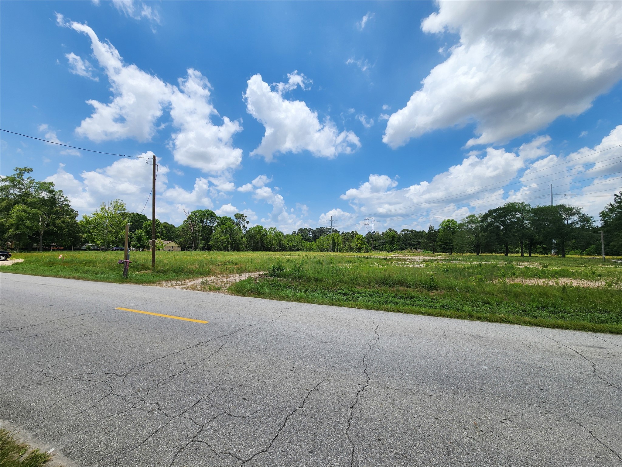 15029 Calhoun Road Conroe, TX 77302 - Photo 15 of 31 Paved road access.