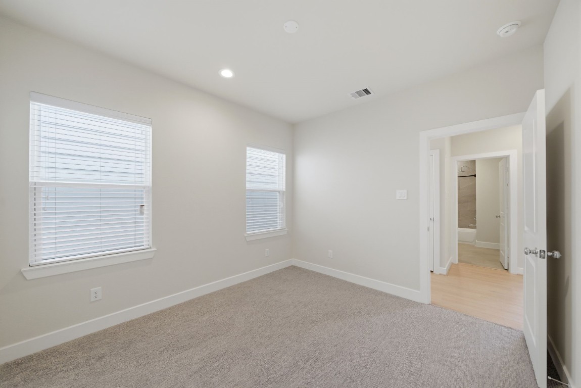 5906 Jasper Jones Way Houston, TX 77091 - Photo 11 of 22 a view of an empty room with a window