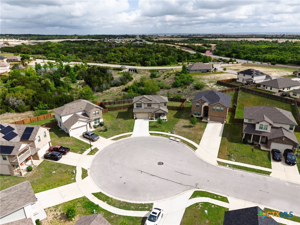 2044 Mallard Court Copperas Cove, TX 76522 - Photo 1 of 41 an aerial view of a house with a garden potted plants and large trees