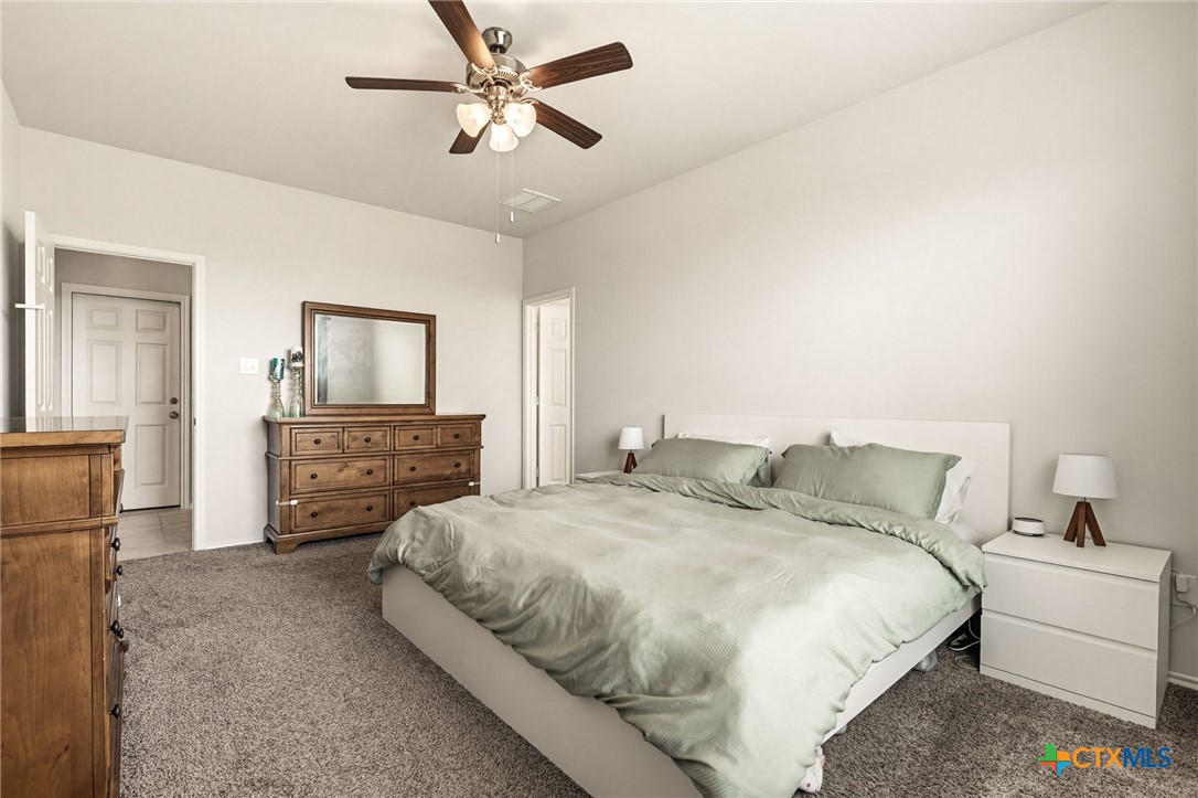 2044 Mallard Court Copperas Cove, TX 76522 - Photo 15 of 41 a spacious bedroom with a bed and a tv