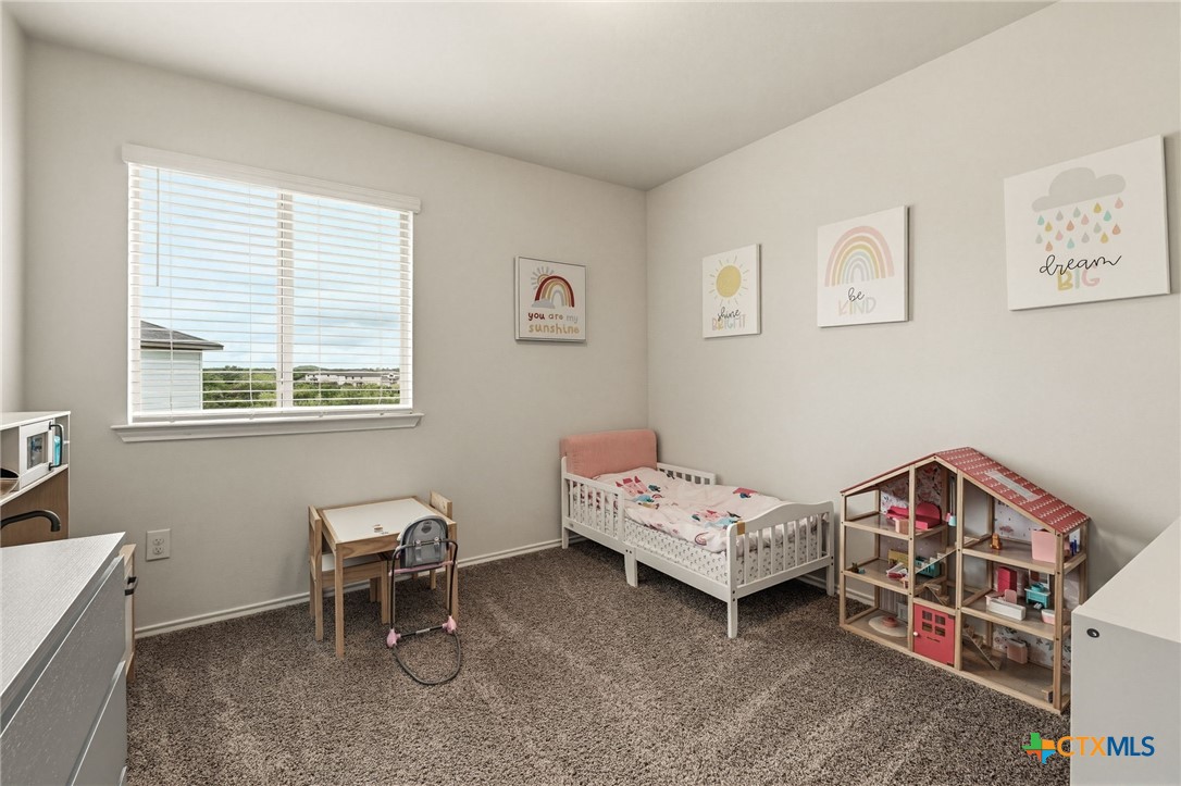 2044 Mallard Court Copperas Cove, TX 76522 - Photo 24 of 41 a bedroom with a bed and a window